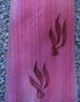 close up detail, painted flame motifs on silk ombre raspberry pink necktie