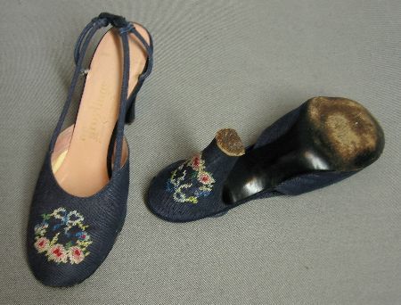 overhead view of floral wreath embroidery on 50s shoes, heels and soles