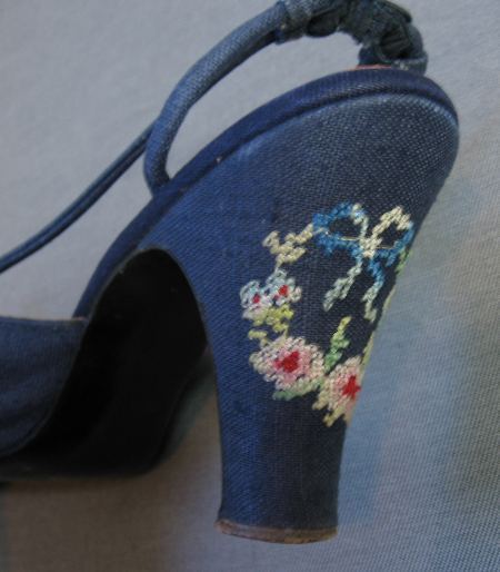 close up of needlepoint embroidery on back of heel, 1950s slingback heels