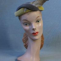 1930s 1940s designer hat with winged feather accent