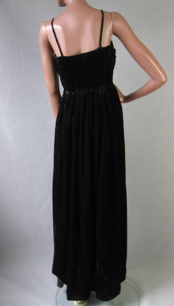 back view, strappy black velvet evening gown