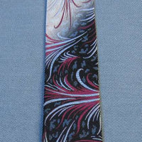 1950s vintage neck tie with feather firework pattern