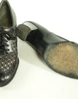 heel cap and soles of oxford heeled shoes