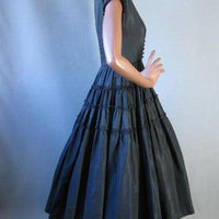 side view of 50s fit and flare cocktail dress